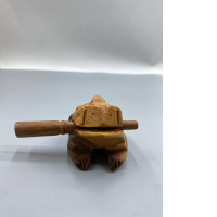  hand-carved wooden frog guiro rasp, a musical percussion instrument. 