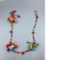 handmade Indian decorative elephant and bird door hanging or garland with beads and bells. It is typically used to welcome visitors and decorate doors and windows. 