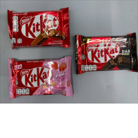Set of 3 Kit Kat chocolate bars from Nestlé come in classic milk chocolate, pink strawberry, and dark chocolate flavors.