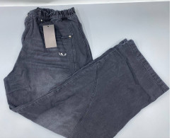 Velika "Logo" Baggy Jeans in a washed black or grey color. Velika "Logo" Baggy Jeans in a washed black or grey color.