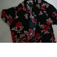 Black blouse with red flowers