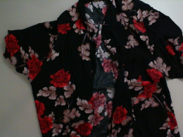 Black blouse with red flowers