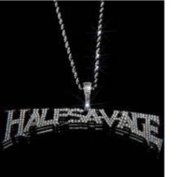 Half Savage necklace in silver-tone with a rope chain. Half Savage necklace in silver-tone with a rope chain.