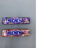 Set of 2 Morinaga Hi-Chew fruit chews in grape and strawberry flavors. 