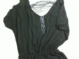 Black women's blouse, decorated with beads