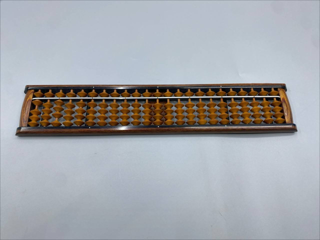 Japanese soroban abacus, a traditional calculating tool. Japanese soroban abacus, a traditional calculating tool.
