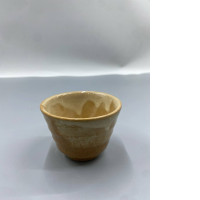This Japanese hagi glass cup is likely a sake cup (guinomi).