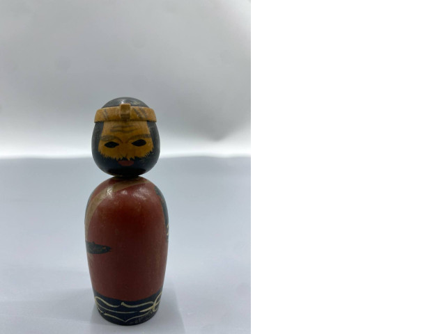 vintage Japanese kokeshi wooden bobblehead doll, which is a traditional folk craft originating from the Tōhoku region of Japan. vintage Japanese kokeshi wooden bobblehead doll, which is a traditional folk craft originating from the Tōhoku region of Japan.