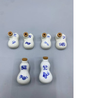 Set of 6 Kiyoken Hyo-chan ceramic soy sauce containers. 