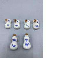 Set of 6 Kiyoken Hyo-chan ceramic soy sauce containers. 