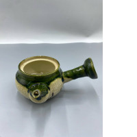 A Japanese glass bowl for resting green tea, known as yuzamashi. A Japanese glass bowl for resting green tea, known as yuzamashi.