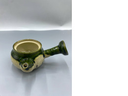 A Japanese glass bowl for resting green tea, known as yuzamashi.