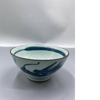 Saikai Pottery Hasami ware porcelain rice bowl with a blue dragon pattern. 