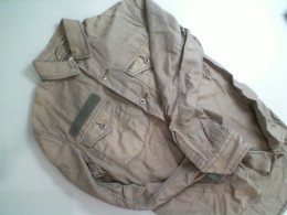 Men's beige ruffled jacket with studs