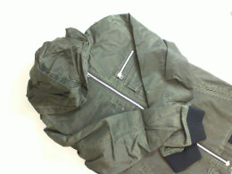 Green jacket with a zipper