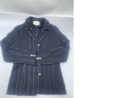 Lautreamont brand blazer is a navy blue structured jacket featuring white vertical stripes, long sleeves, and a button-down front.