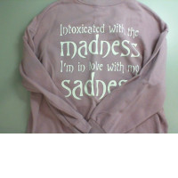 Pink women's sweater with inscription