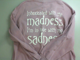 Pink women's sweater with inscription