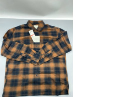 Men's flannel shirts from Timberland are made from a blend of cotton and polyester.