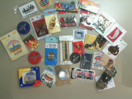 A large collection of magnets from different countries A large collection of magnets from different countries