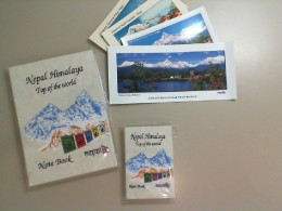 A set of 2 notebooks and 4 postcards from Nepal.