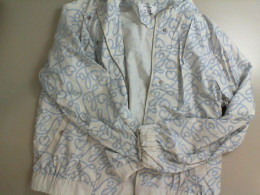 Women's jacket, white with a blue pattern Women's jacket, white with a blue pattern