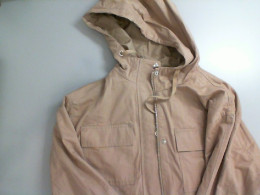 Light brown women's jacket with a hood Light brown women's jacket with a hood
