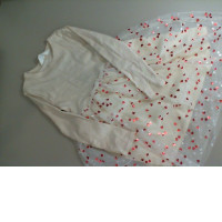 Children's beige dress with a heart