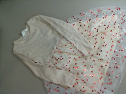 Children's beige dress with a heart