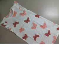 Children's beige dress with a butterfly