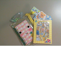 A set of transparent pencil case, notepad, pencil and stickers