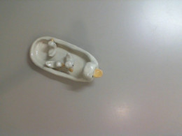 Ceramic duck + 3 small ducklings