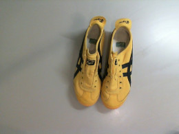 Yellow sneakers for a teenager