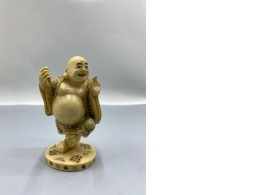 Small carved figurines, a Japanese craft called "netsuke".