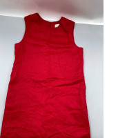A short red linen dress from the brand Reformation. A short red linen dress from the brand Reformation.