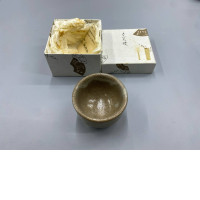 Tea cup with empty box.