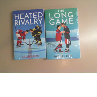 A set of 2 volumes, Raichel Reid. Heated Rivalry and The Long Game