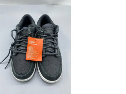 This shoe is the Nike Dunk Low QS.