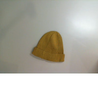Yellow knitted hat Yellow knitted hat