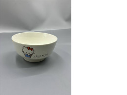 White glass salad bowl with Hello Kitty design.