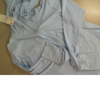 Light blue women's sports jacket with a hood