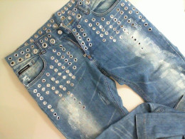 Jeans with iron rivets