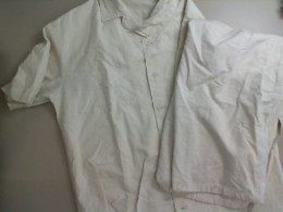 Men's light-colored suit, shirt and trousers