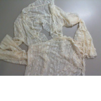 Beachwear with a transparent swimsuit, a jacket and a skirt Beachwear with a transparent swimsuit, a jacket and a skirt