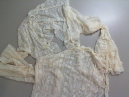 Beachwear with a transparent swimsuit, a jacket and a skirt