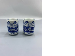 set of 2 A pair of Japanese sumo-themed tea cups. set of 2 A pair of Japanese sumo-themed tea cups.