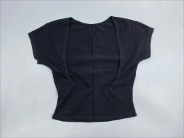 Black T-shirt with a wide neckline at the back.