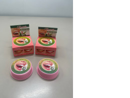 A set of four toothpastes