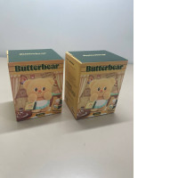 a set of two butterbear toys