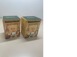 a set of two butterbear toys